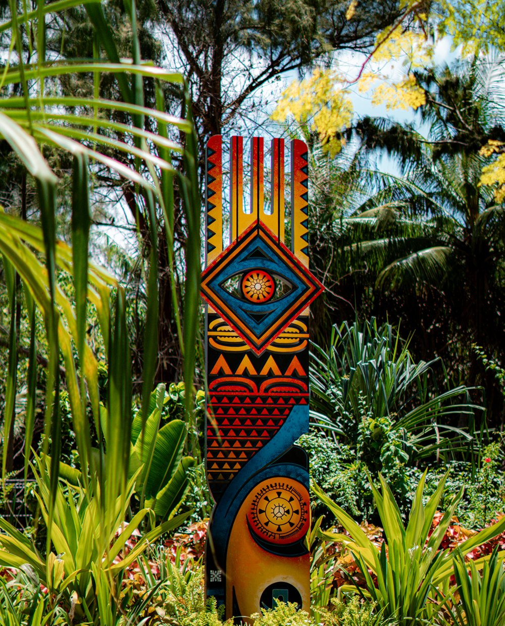Colourful sculpture in a tropical garden