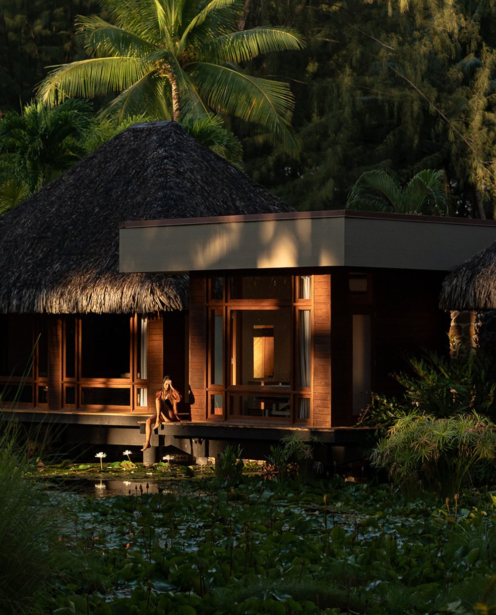 The Tavai Spa lit up at the heart of the garden