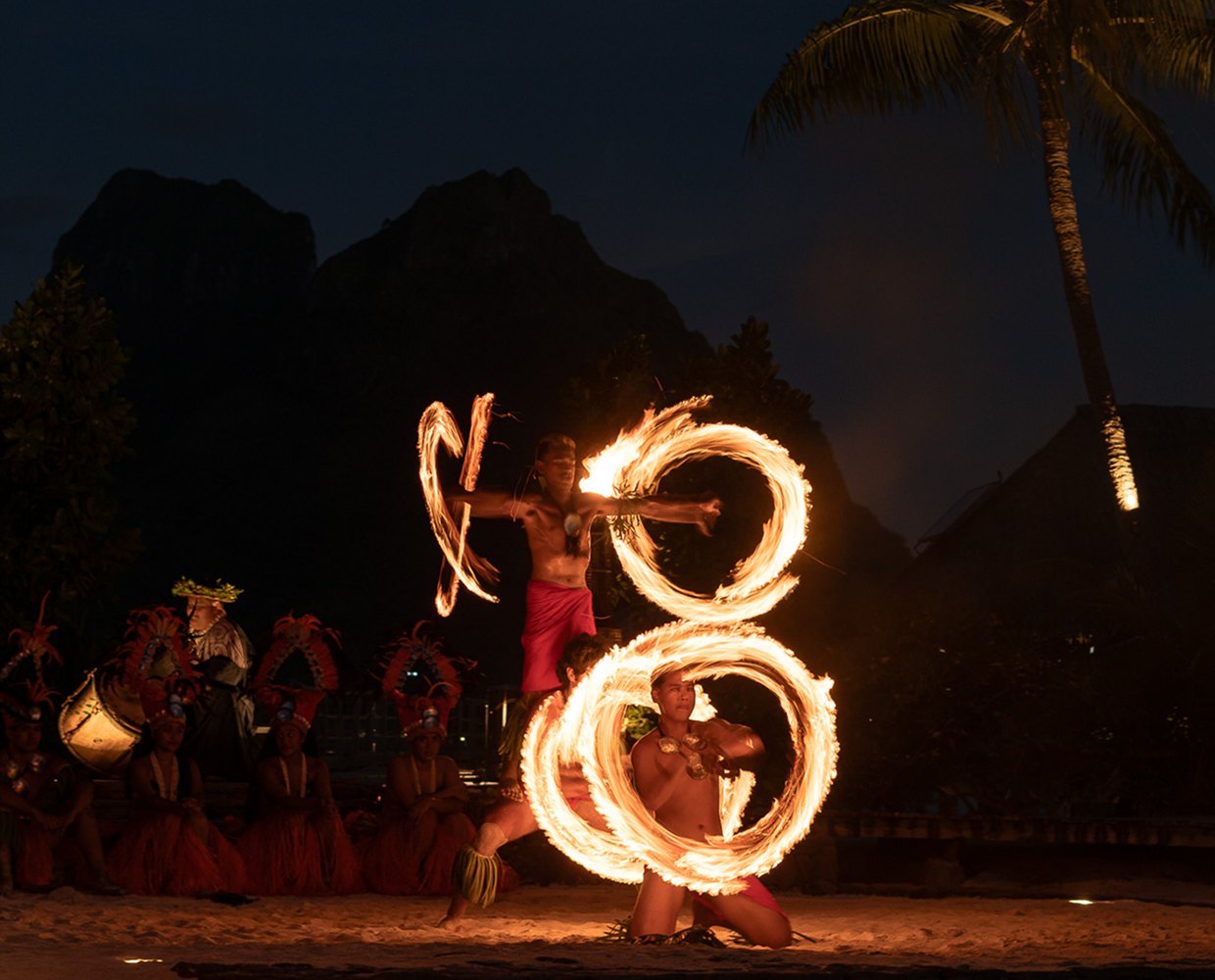 Fire dancers during a nighttime show
