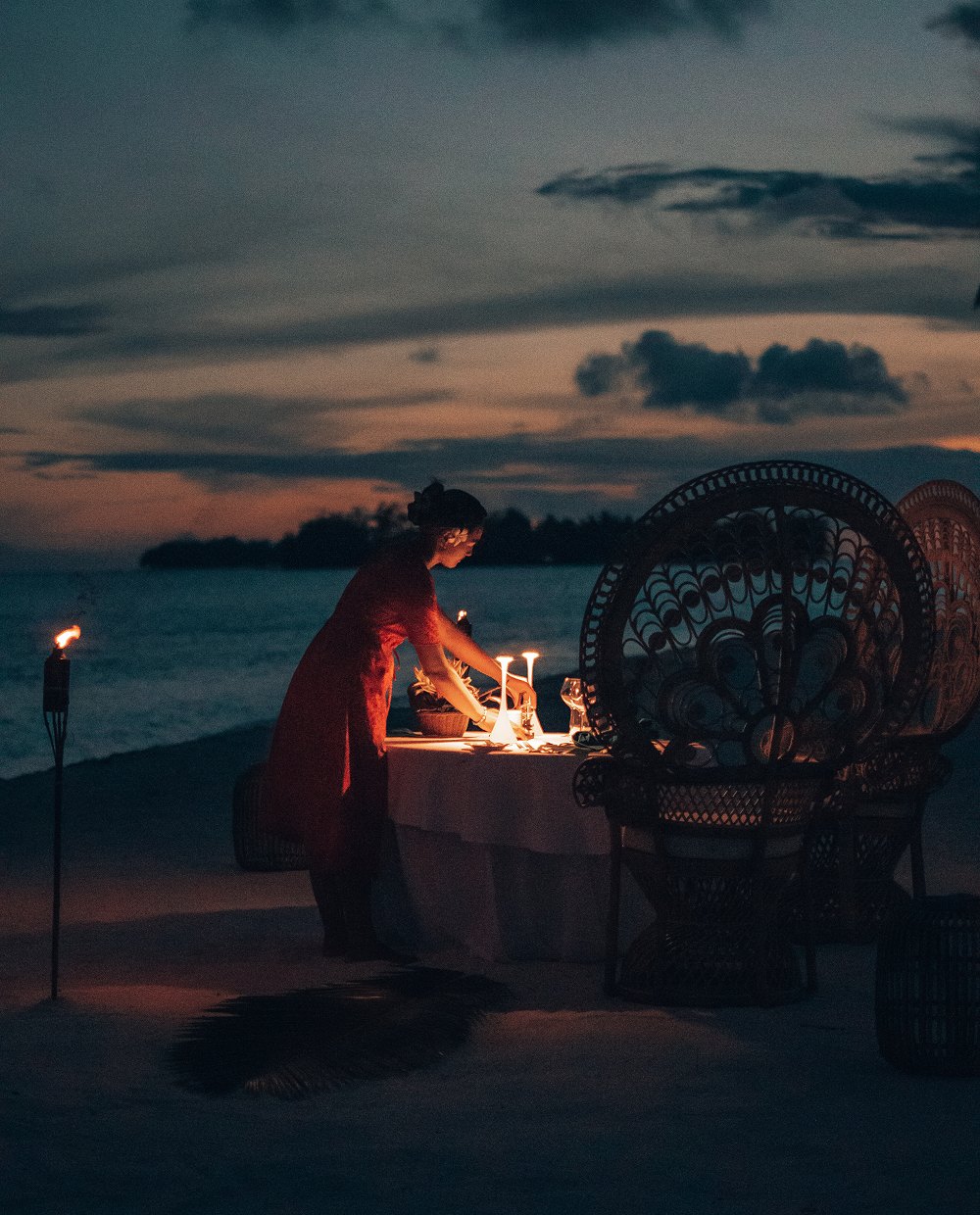 Private dinner by the water at dusk